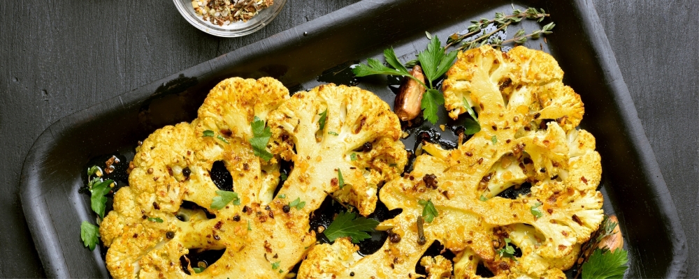https://www.essentialcuisine.com/recipes/basil-cauliflower-steaks/ 