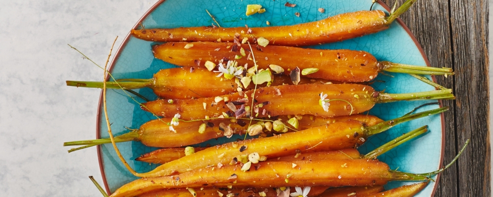 Harissa and Maple Syrup Roasted Carrots with Pistachios