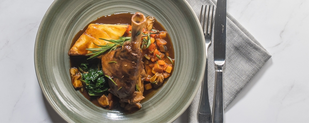 Braised Lamb Shank, Roast Garlic and Rosemary Jus 