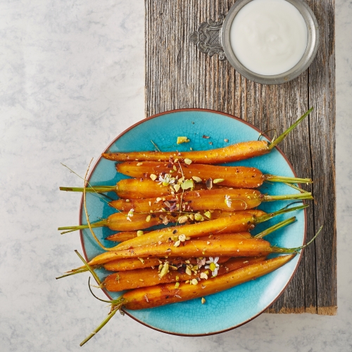 Harissa and Maple Syrup Roasted Baby Carrots with Pistachios