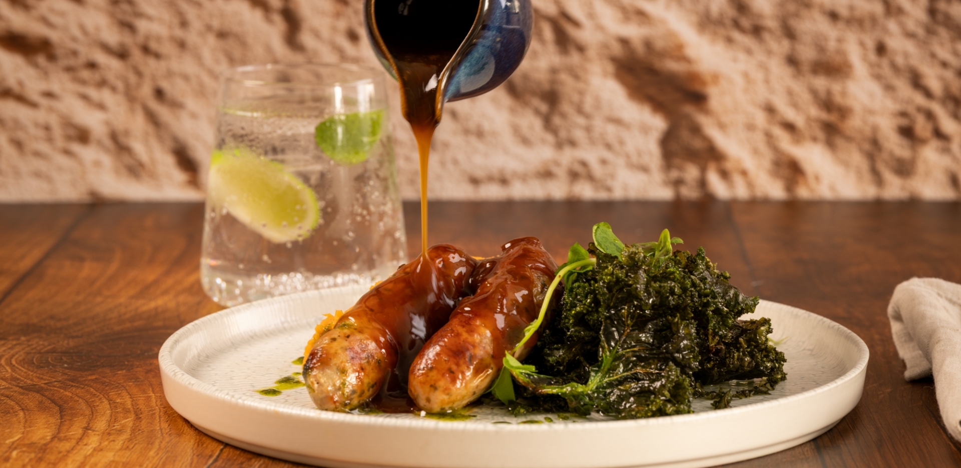 Turkey and Sage Sausages, with Sweet Potato Mash and Caramelised Onion Gravy